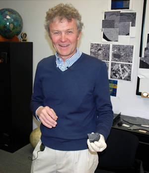 Carl Agee, director and curator, University of New Mexico’s Institute of Meteoritics, displays NWA 7034, a Martian meteorite nicknamed Black Beauty.